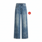 Dambyxor i denim med breda ben och blommönstrad jacquar