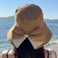 👒 BEGRÄNSAD TID -50% RABATT! ✨ Dam solhatt med bred brätte och rosett – Hopfällbar, 360° skydd 🎀